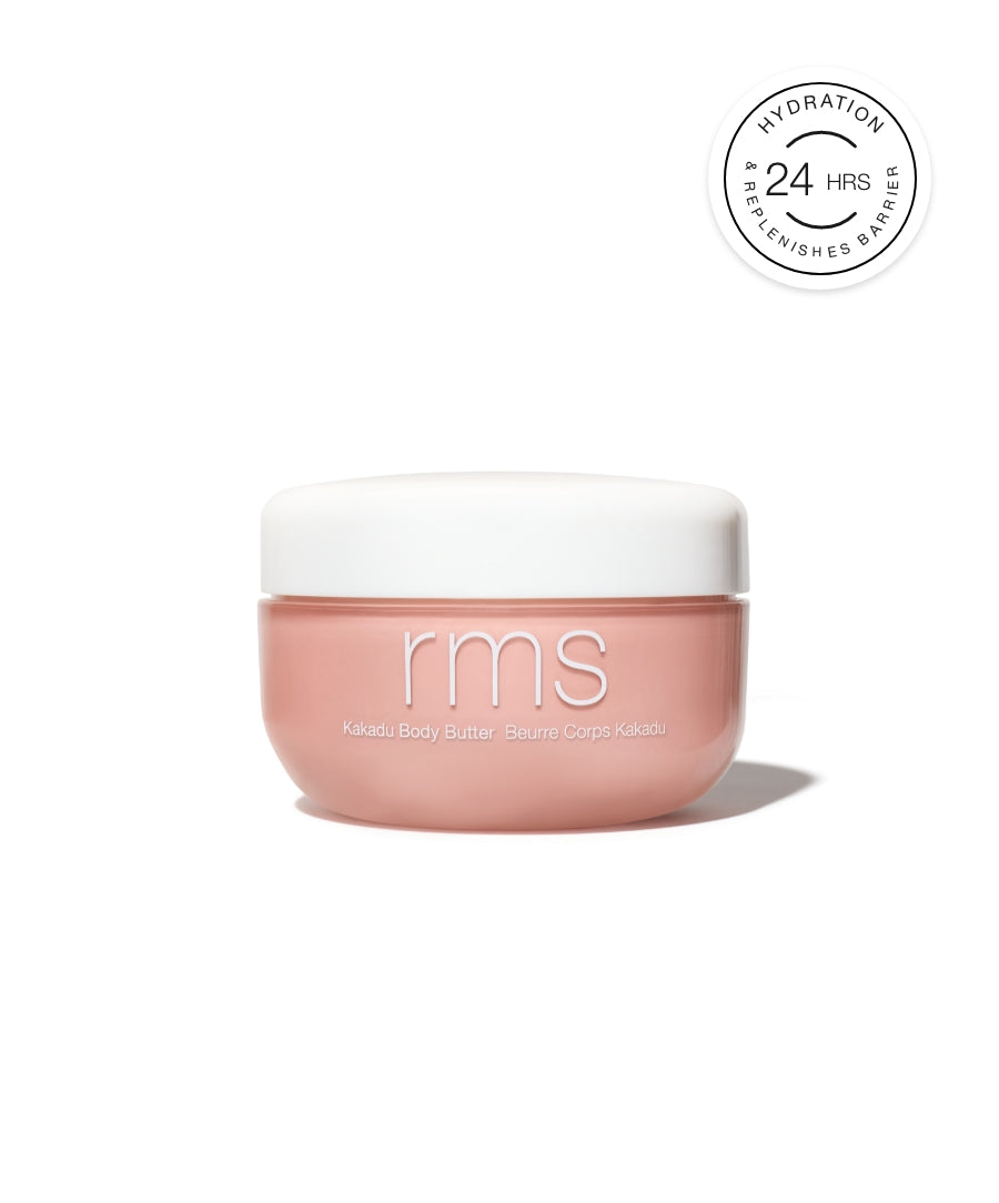 Jar of Kakadu Body Butter by RMS Beauty in soft pink packaging with white lid, highlighting 24-hour hydration and skin barrier replenishment benefits.