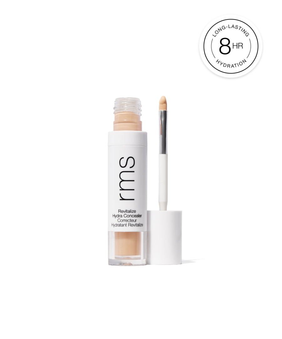 Open tube of Revitalize Hydra Concealer with wand applicator beside it, featuring lightweight, hydrating formula for long-lasting coverage up to 8 hours.
