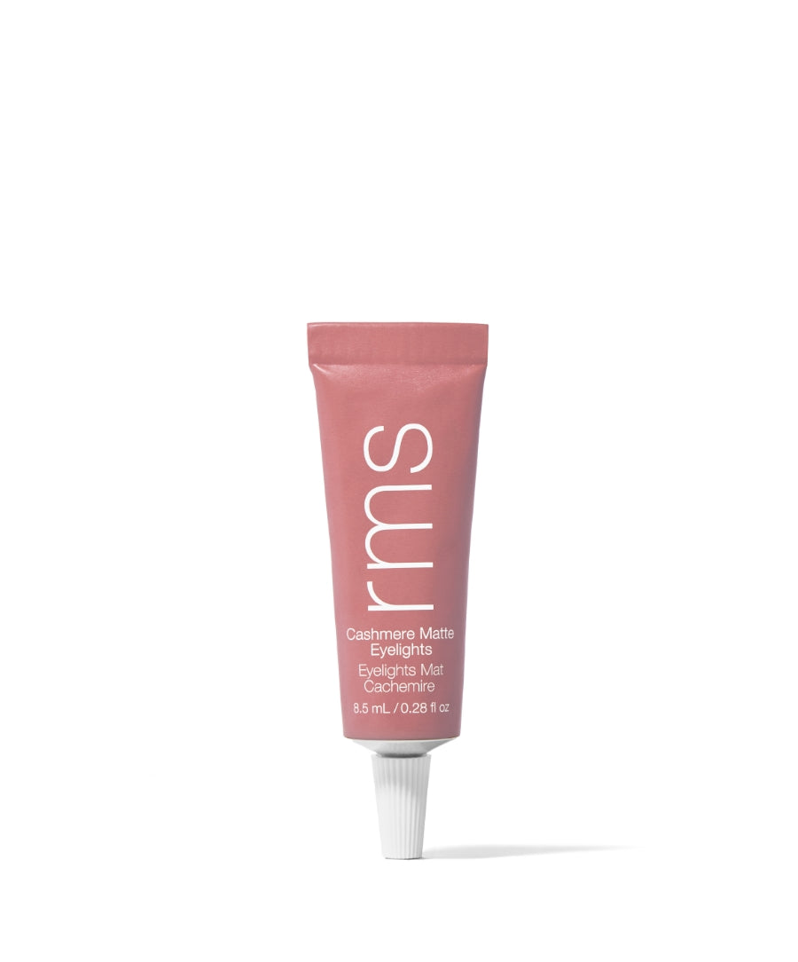 Tube of Cashmere Matte Eyelights eyeshadow in a muted pink shade with clean beauty, natural ingredients, and sustainable packaging by RMS Beauty.