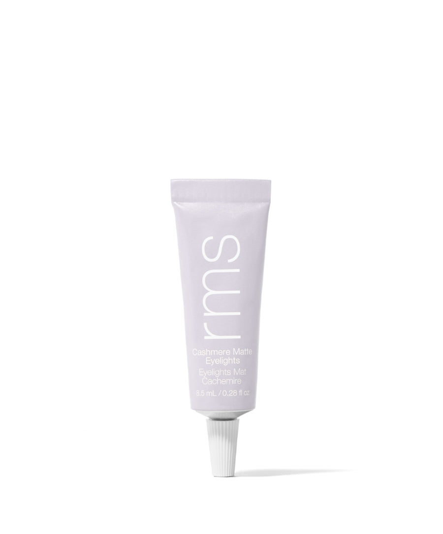 Tube of Cashmere Matte Eyelights makeup with a soft pastel lavender color, featuring clean beauty and natural ingredients in sustainable packaging.