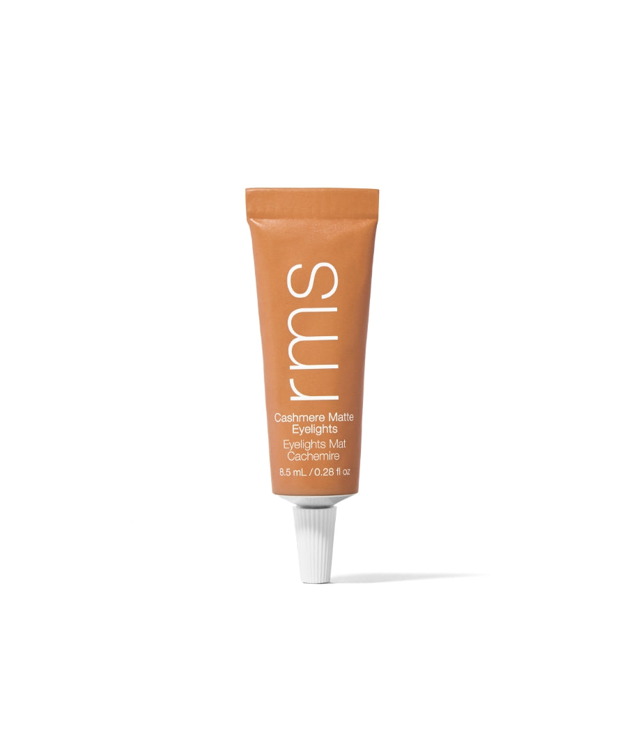 Tube of Cashmere Matte Eyelights makeup in a warm, dusty trail shade with a matte finish, featuring clean beauty and natural ingredients for a subtle eye highlight.