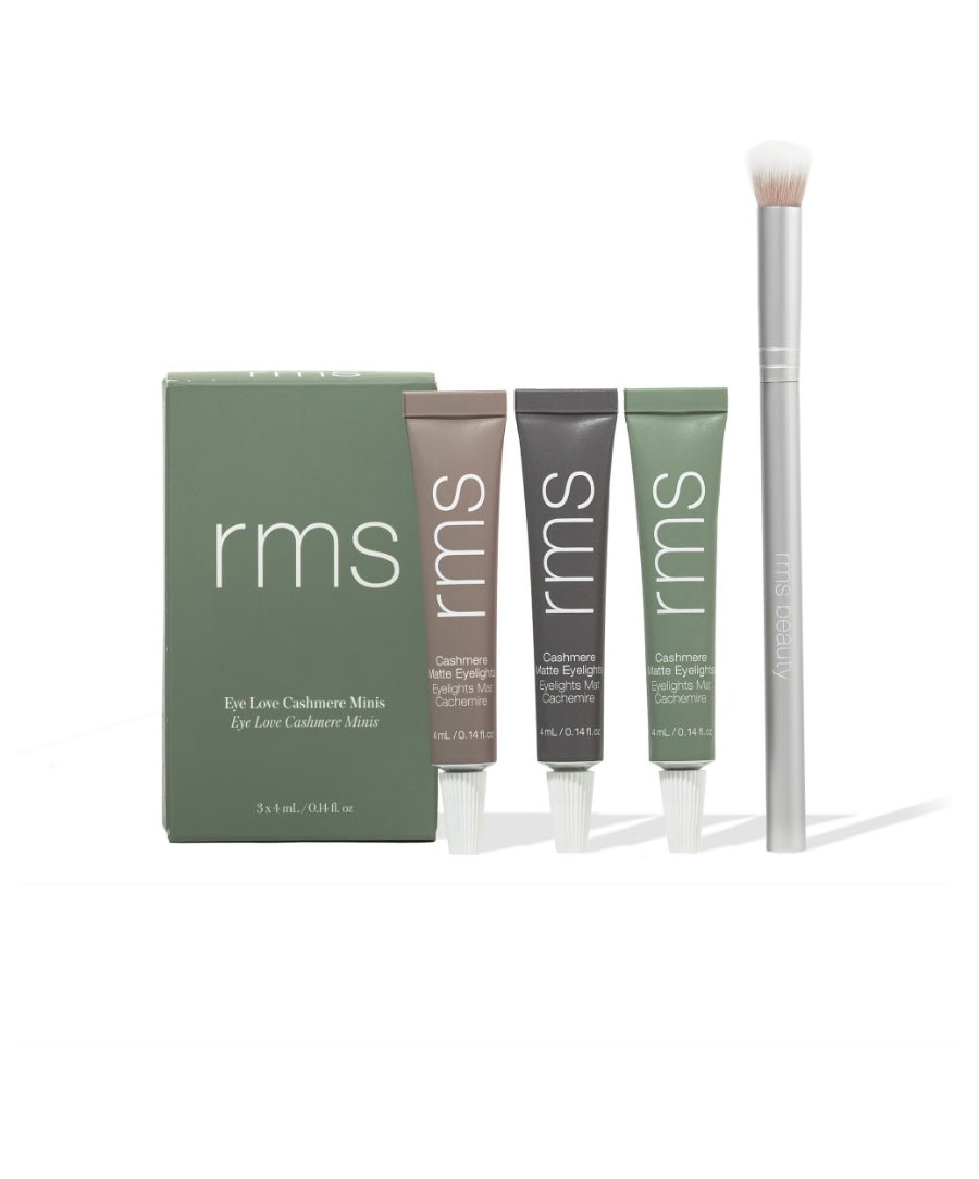 Set of three neutral-toned mini eye polishes with applicator brush and green packaging box, featuring the Mini Cashmere Eyelights Trio + Eye Polish Brush for clean beauty and sustainable packaging.