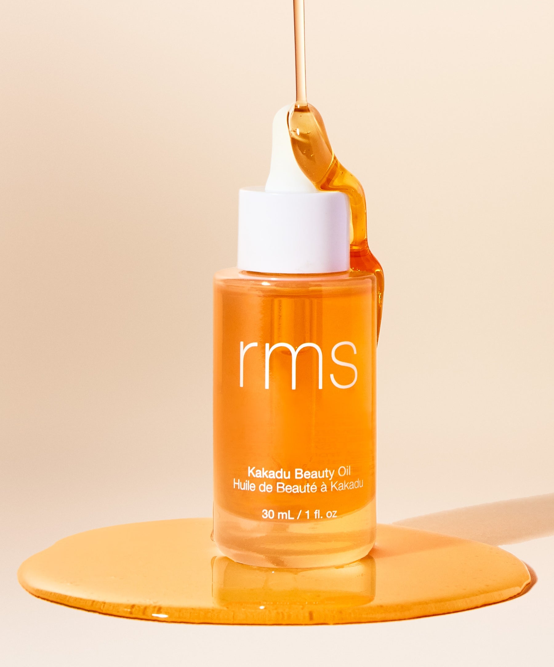 RMS Kakadu Beauty Oil in a clear bottle with a dropper