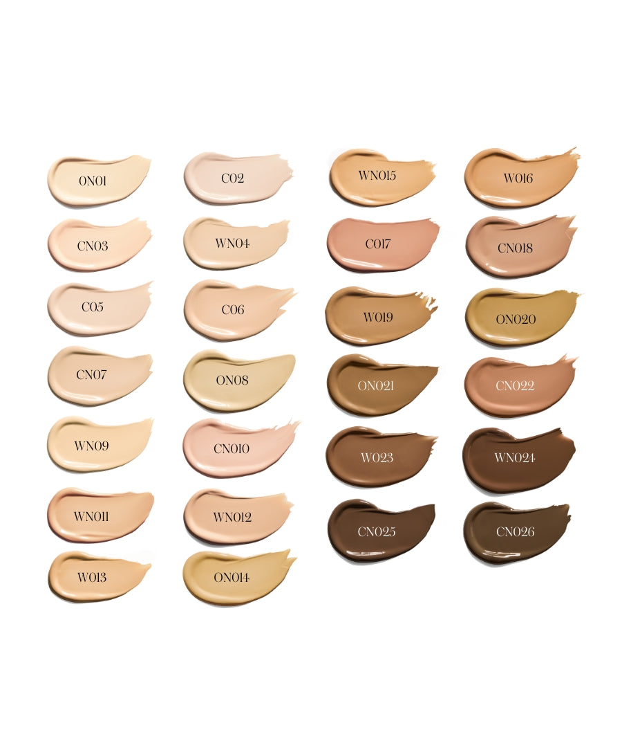 Various swatches of Revitalize Hydra Concealer shades arranged in rows, showcasing a diverse range of natural tones suitable for different skin colors.