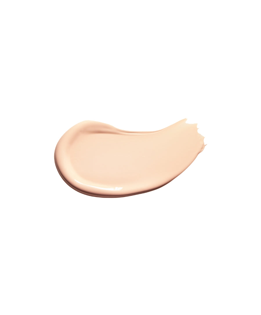 A smooth, light beige swatch of Revitalize Hydra Concealer showcasing its creamy, hydrating texture ideal for natural makeup looks.