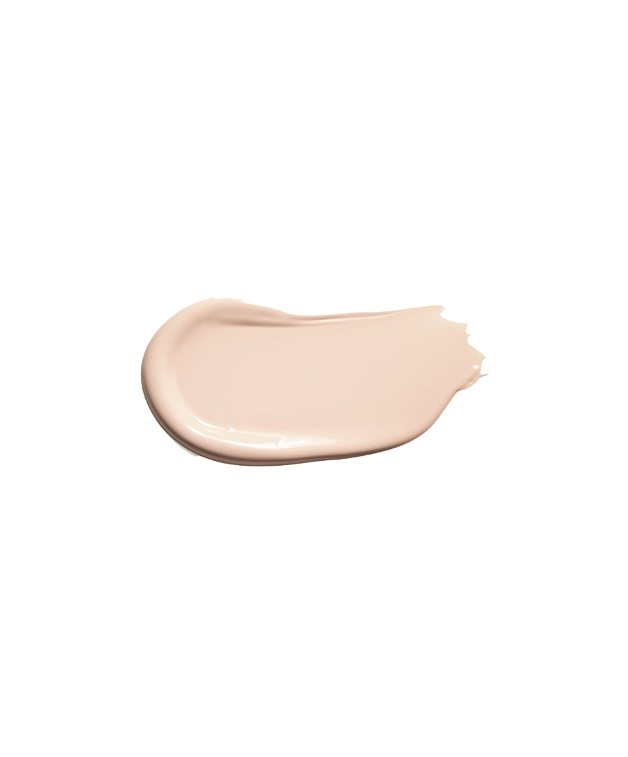 Smooth, creamy swatch of Revitalize Hydra Concealer in a light, natural shade, highlighting clean beauty and skincare infused makeup qualities.