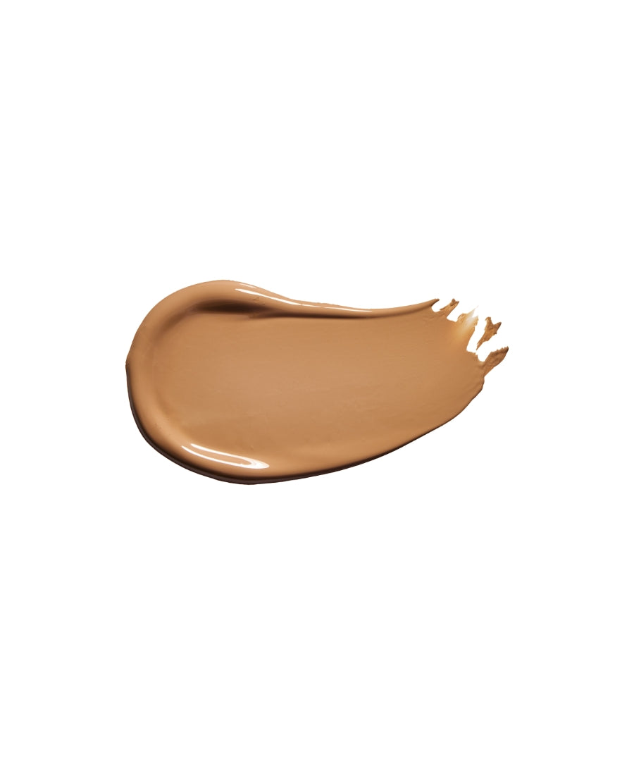 Creamy medium beige swatch of Revitalize Hydra Concealer showcasing smooth, hydrating texture ideal for natural-looking coverage with clean beauty and skincare infused makeup benefits.