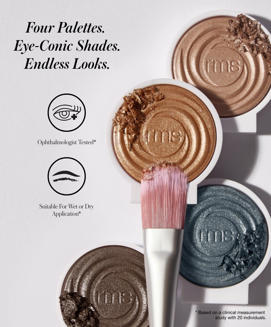 Close-up of four shimmering eyeshadow palettes in bronze, gold, taupe, and deep blue shades with a makeup brush, featuring ReDimension Hydra Eyes Quartet in clean, cruelty-free formula.