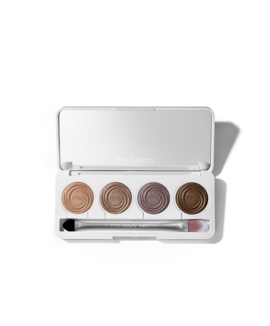 ReDimension Hydra Eyes Quartet eyeshadow palette with four natural, earthy shades and an applicator brush in sleek white packaging designed for clean beauty and cruelty-free makeup.