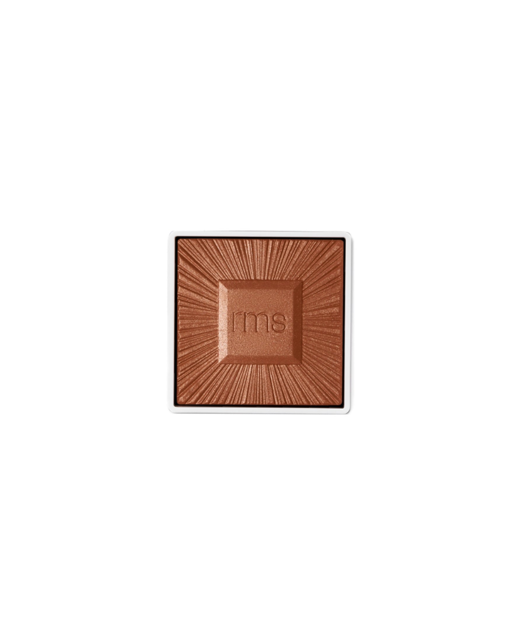Close-up of a brown pressed powder bronzer embossed with "rms," highlighting the clean beauty ReDimension Hydra Bronzer with natural ingredients and sustainable packaging.