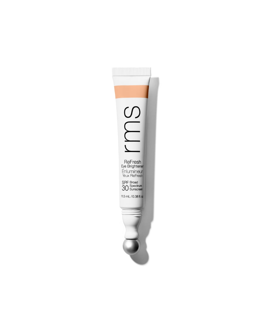 Tube of ReFresh Eye Brightener Broad Spectrum SPF 30 + Correcting Tint by RMS Beauty, featuring clean, natural ingredients and a metal applicator tip for easy application.