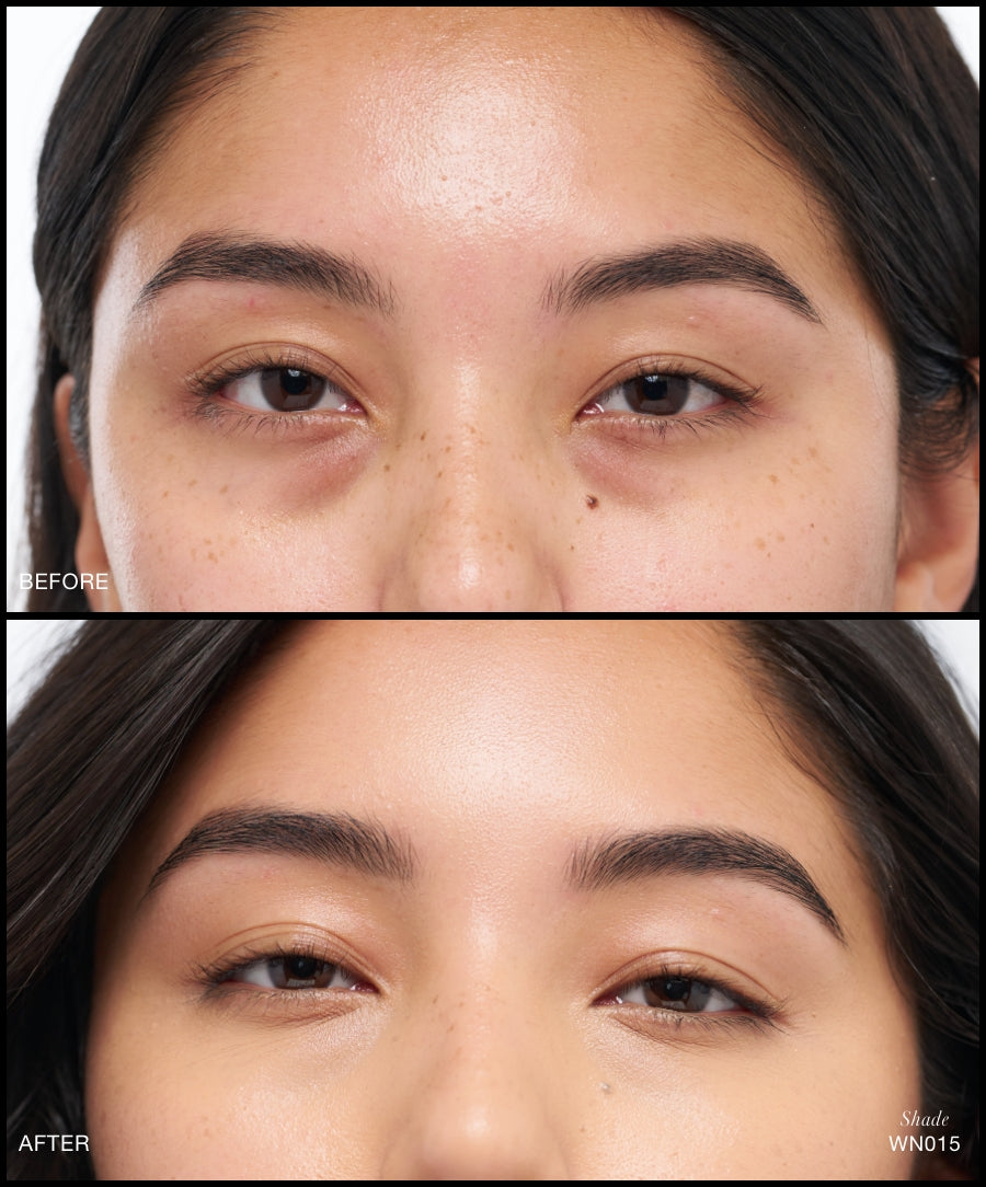 Close-up before and after images of a woman's eyes demonstrating the smooth coverage and brightening effect of Revitalize Hydra Concealer in shade WN015 on natural skin with freckles and dark circles.
