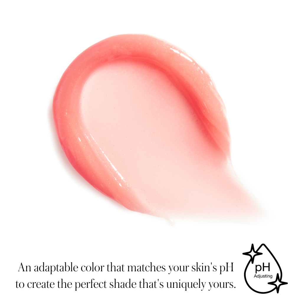 Swatch of Liplights Cream Lip Gloss in a soft, sheer pink shade with a glossy finish, showcasing its pH-adapting formula for a personalized natural look.