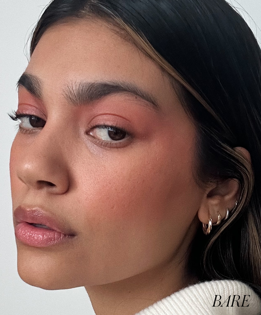 Close-up of a woman with natural makeup showcasing glossy lips wearing Liplights Cream Lip Gloss, highlighting clean beauty and cruelty-free makeup benefits.