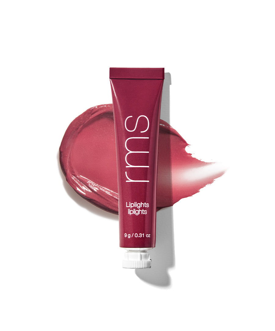 Tube of Liplights Cream Lip Gloss in a deep rose shade with a smooth swatch of the glossy, creamy formula on a white background, highlighting clean beauty and natural ingredients.